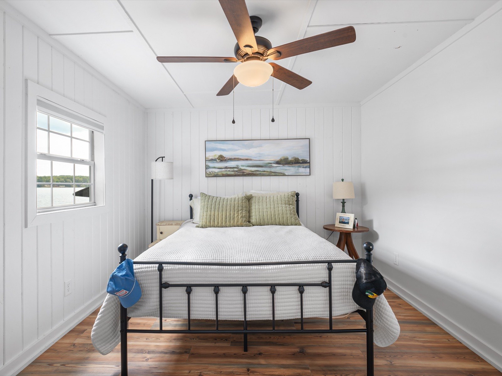 Bedroom remodel with lake view and shiplap walls