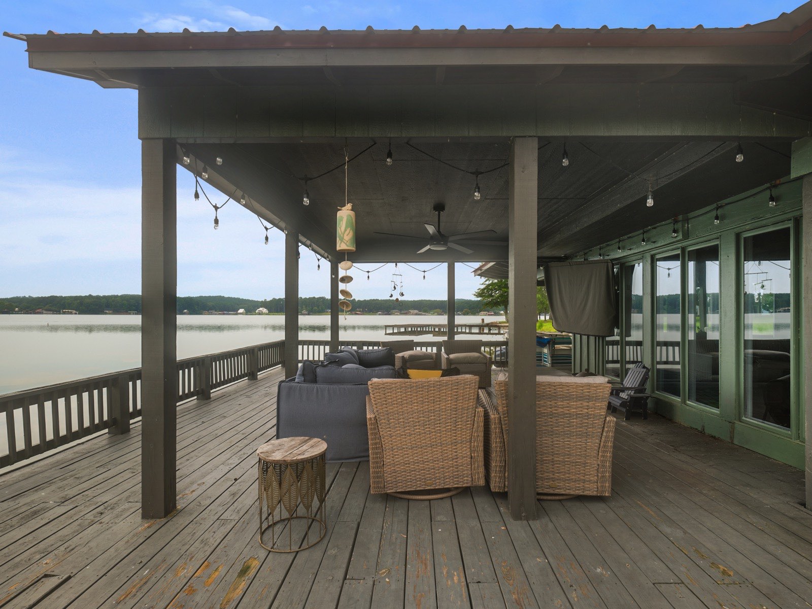 Covered lakeside deck with outdoor living